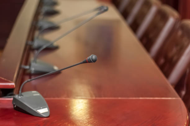 istock Desktop microphone in the conference room. 1081561526