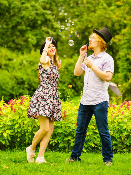 istock Couple blowing bubbles outdoor 1081563332