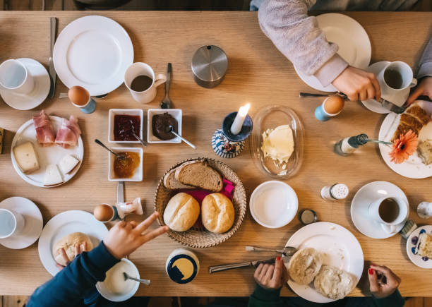 istock overhead view on family at breakfast table 1081563502