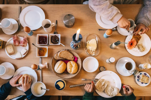 istock overhead view on family at breakfast table 1081563692