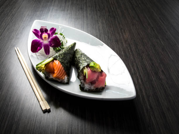 Salmon Tuna Sushi Handroll In Elegant Restaurant Setting