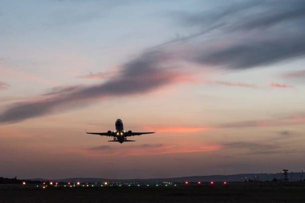 istock Take-off plane in the evening from the airport. 1081590784