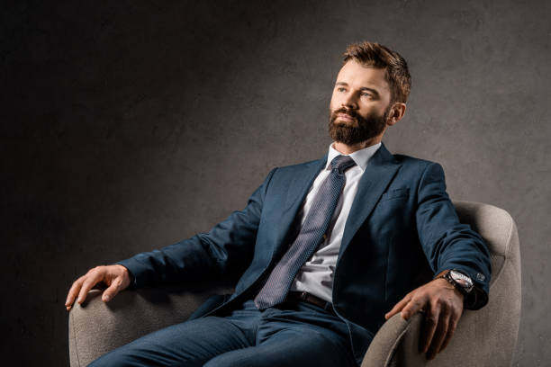 istock confident bearded businessman resting in armchair 1081599090