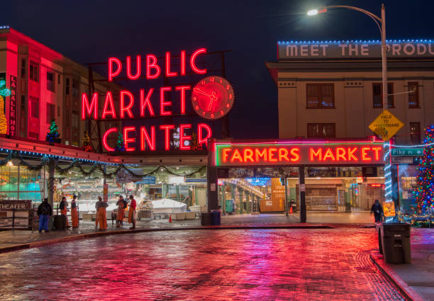 Seattle Pike Place Market in the Morning Seattle, WA USA - December 12th, 2018. Pike Place Market is a public market overlooking the Elliott Bay waterfront in Seattle. pike place market stock pictures, royalty-free photos & images