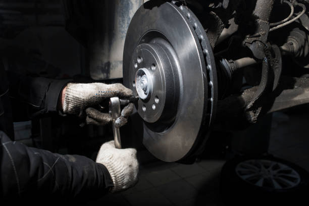 Car braking system repair. Car braking system repair. brake disc photos stock pictures, royalty-free photos & images