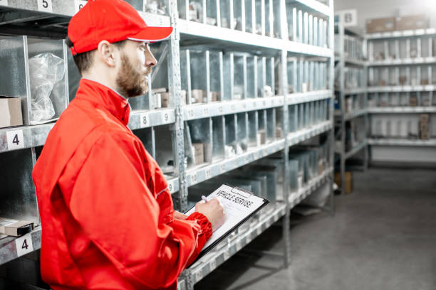 istock Warehouse worker with clipboard in the storage 1081608900