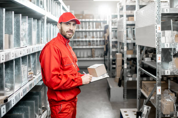 istock Warehouse worker with clipboard in the storage 1081609102