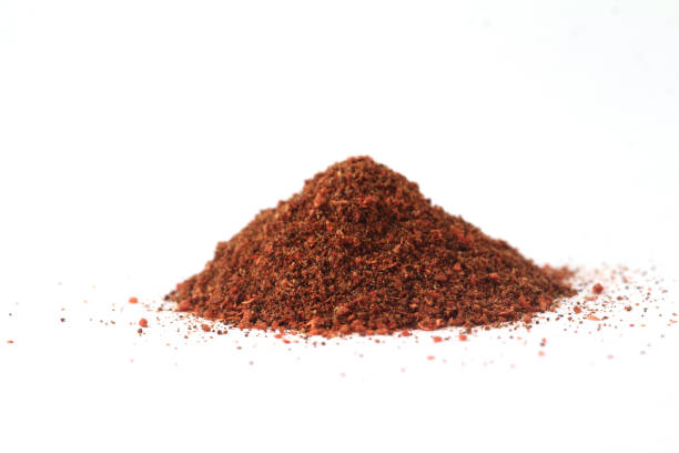 istock pile of paprika on white background 1081609304