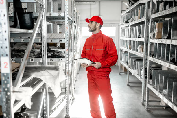 istock Warehouse worker with clipboard in the storage 1081609312