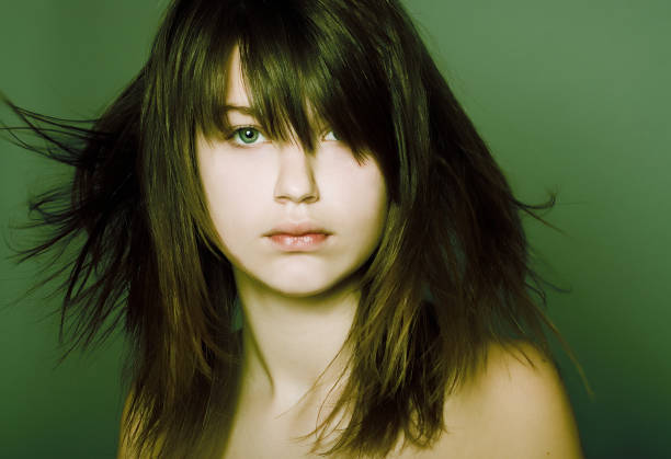 istock Young Woman on Green Background 108161351