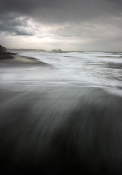 Calm ocean water surface with gentle ripples and bubbles