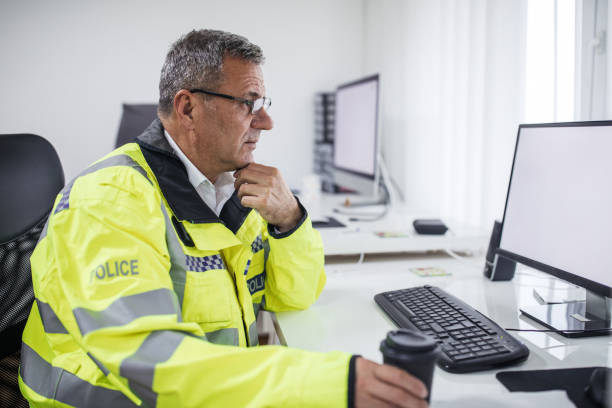 istock Traffic officer sitting at the office 1081614498