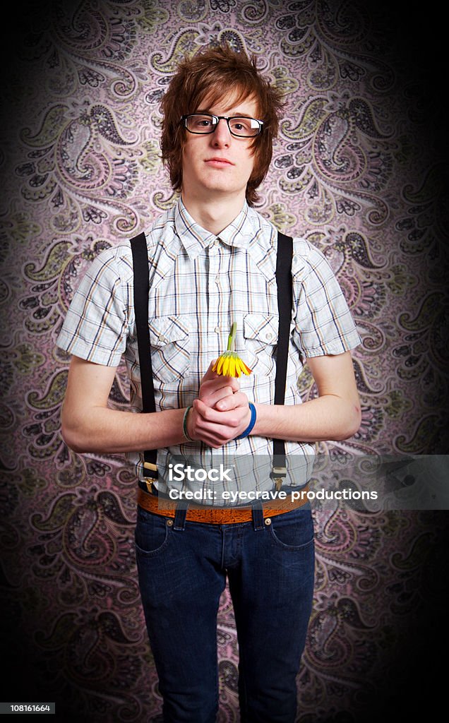 Porträt von naiv Teenage Boy Holding Welk Blume - Lizenzfrei Gürtel Stock-Foto