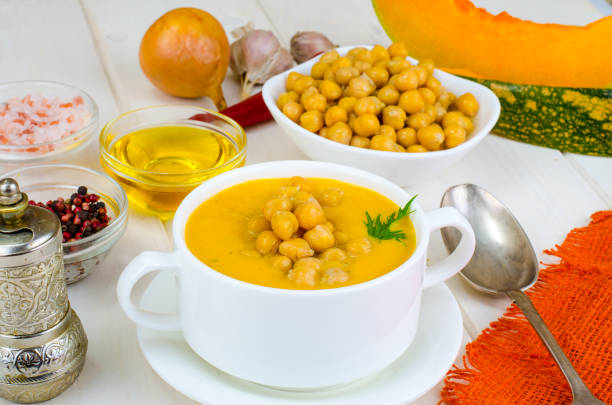istock Vegetarian dishes. Pumpkin cream soup with chickpeas 1081619792