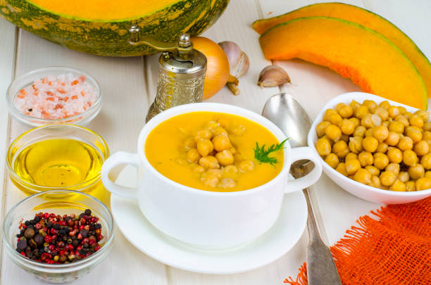 istock Vegetarian dishes. Pumpkin cream soup with chickpeas 1081619842