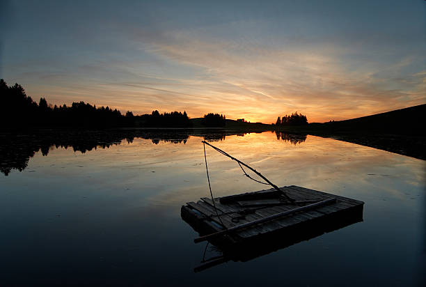 summer beautiful landscape with  boat on lake  at sunrise