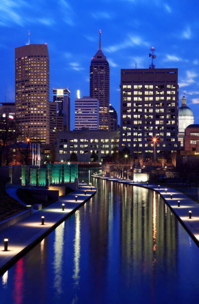 View down Central Canal towards downtown Indianapolis, Indiana.  Alongside the canal is the Medal of Honor Memorial\n