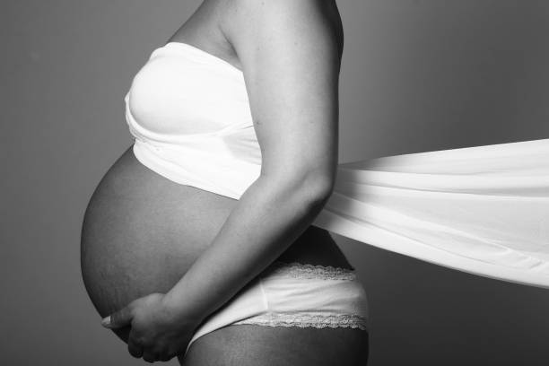 istock Mixed race pregnant woman 1081624030