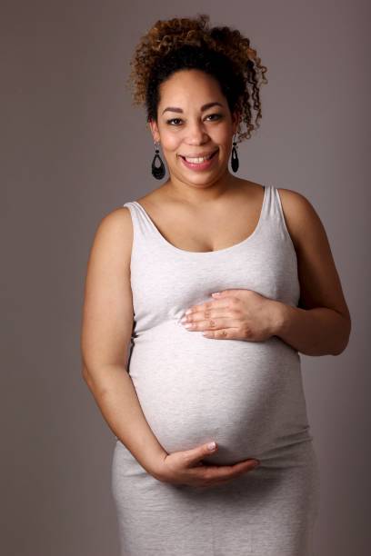istock Mixed race pregnant woman 1081624052