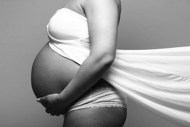 istock Mixed race pregnant woman 1081624072