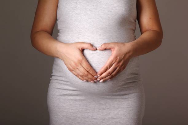 istock Mixed race pregnant woman 1081624160