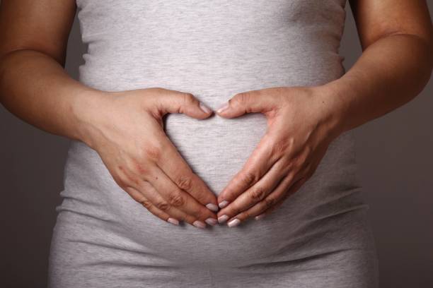 istock Mixed race pregnant woman 1081624262