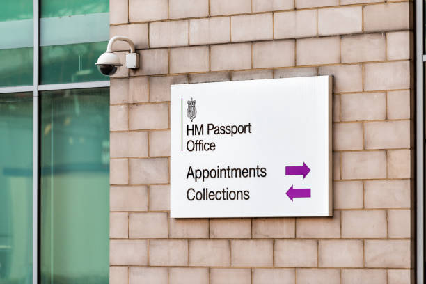 Closeup of sign on building near Victoria Station for HM Her Majesty's Passport Office, Appointments and Collections London, United Kingdom - September 15, 2018: Closeup of sign on building near Victoria Station for HM Her Majesty's Passport Office, Appointments and Collections hm government stock pictures, royalty-free photos & images