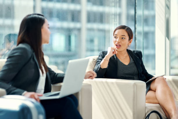 istock Networking in the business class lounge 1081625914