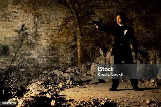 Fighting Back Stock Photo - Download Image Now - Aiming, Full Length, Gun