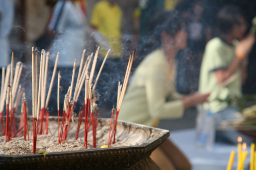 Incense stick for praying Buddha image Stuck in the incense burner has Smoky