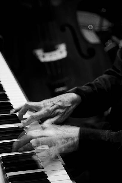 istock Hands Playing Piano-Black and White-More music/motion blur below 108162826