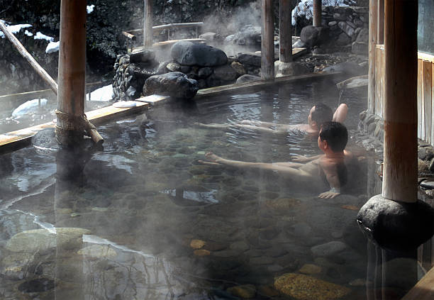 istock Two naked men relaxing in hot Japanese dos 108162898