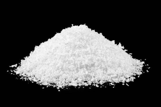 istock Pile of white snow on black background 1081629028