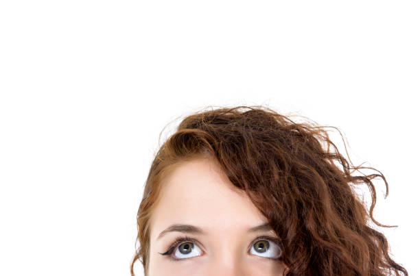 istock Young woman looking up 1081629414