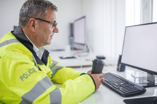 istock Senior traffic officer drinking coffee 1081630084