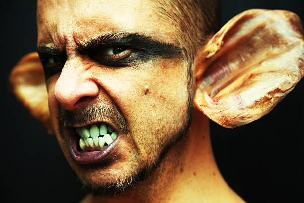 Portrait of Goblin Man with Pigs Ears  goblin stock pictures, royalty-free photos & images
