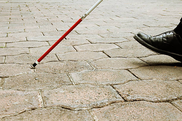 istock Closeup of Blind Man Walking With White Cane 108163269