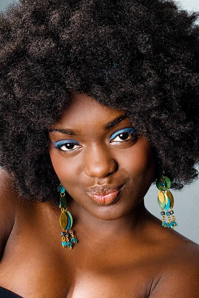 istock Beautiful woman with afro hairstyle 108163493