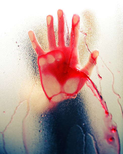 bloody contra la ventana de esmerilado de mano - blood human hand women murder fotografías e imágenes de stock