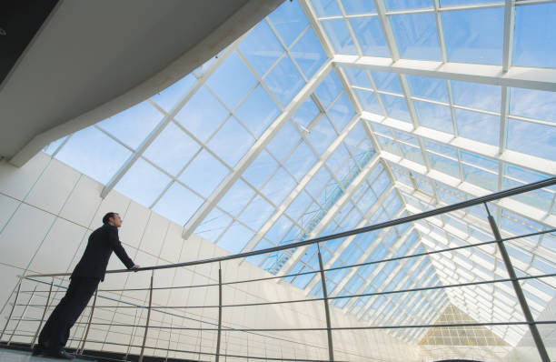 istock The man stand near railing on the office balcony 1081637240