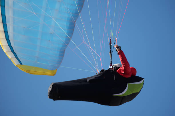 istock A professional paraglider against the blue sky 1081637732