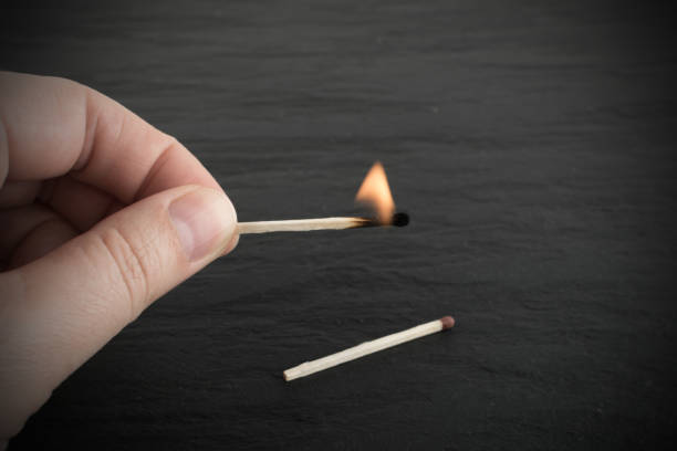istock Burning Match and Matches House 1081640770