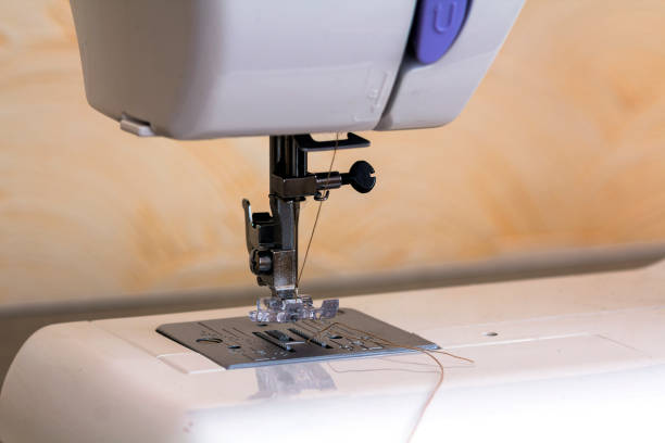 istock Detail of sewing machine and sewing accessories. 1081641674