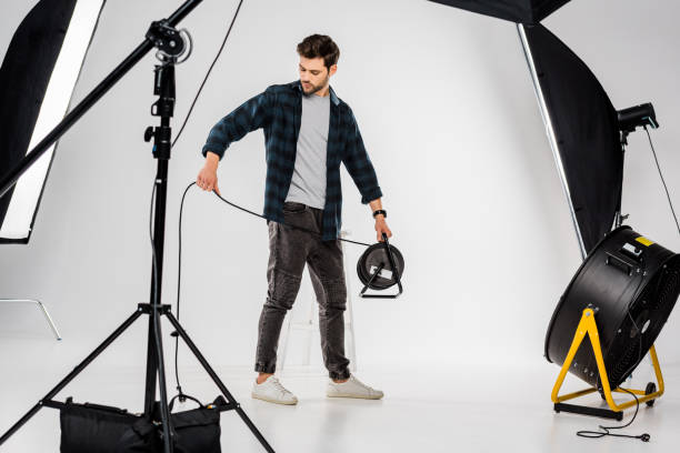 istock young photographer working with equipment in professional photo studio 1081643812