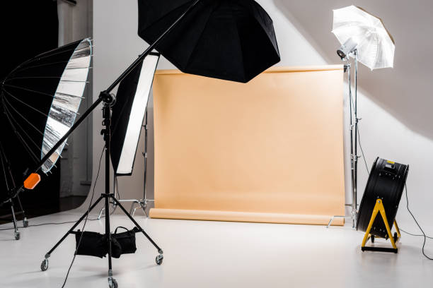istock professional photo and lighting equipment in empty photo studio 1081643934