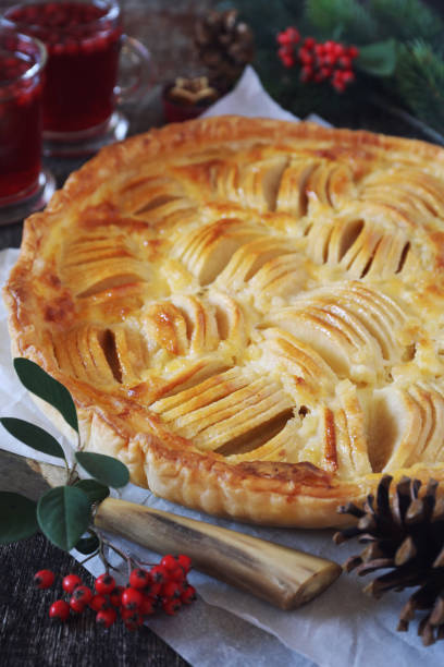 istock Apple tart and two cups of cranberry fruit drink 1081644718