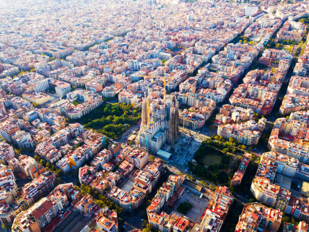 Aerial view of cityscape of Barcelona, Eixample district and Sagrada Familia