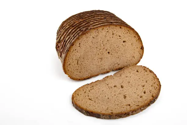 Slices of a rye Bread Loaf isolated on white background