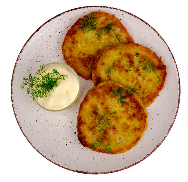 istock Vegetarian vegetable fried potato pancakes with sauce 1081659220