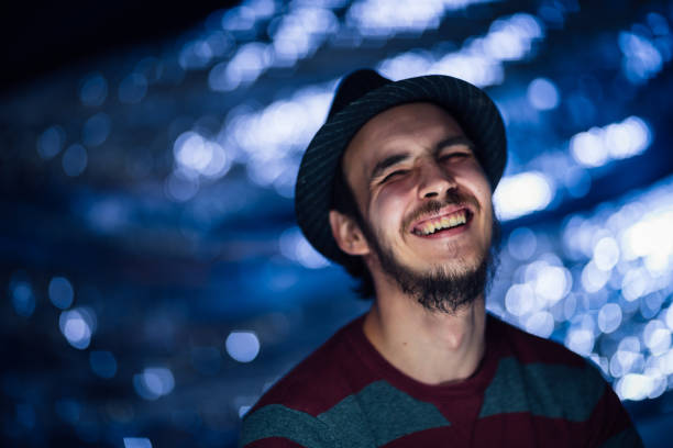 istock portrait of a guy in a hat on a blurred background 1081659242